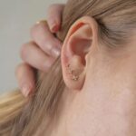 Σετ 3 ατσάλινα σκουλαρίκια λουλουδάκι σε αυτί